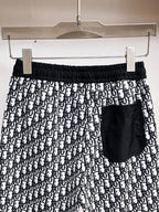 All‑Over Monogram Print Spliced Shorts