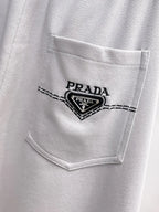 Triangle Badge Seam‑Detail Pants