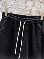 Embossed Pattern Drawstring Sweat Shorts