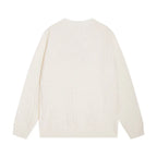 Tone‑on‑Tone Jacquard Sweater