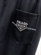 Triangle Badge Seam‑Detail Pants