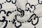 All‑Over Monogram Sweater
