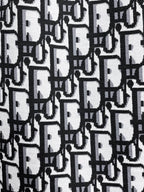 All‑Over Monogram Print Spliced Shorts