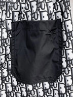 All‑Over Monogram Print Spliced Shorts