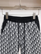 All‑Over Monogram Print Spliced Shorts