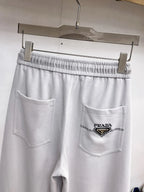 Triangle Badge Seam‑Detail Pants