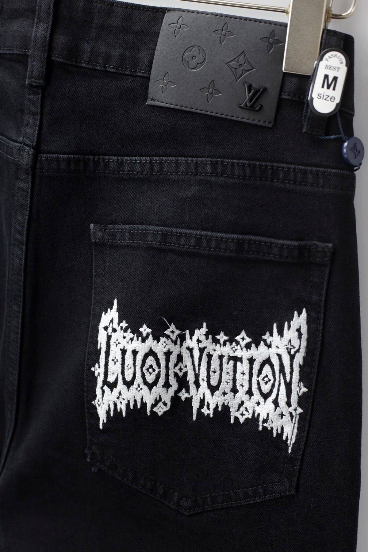 White Letter‑Embroidered Jeans