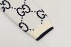All‑Over Monogram Sweater