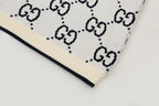 All‑Over Monogram Sweater