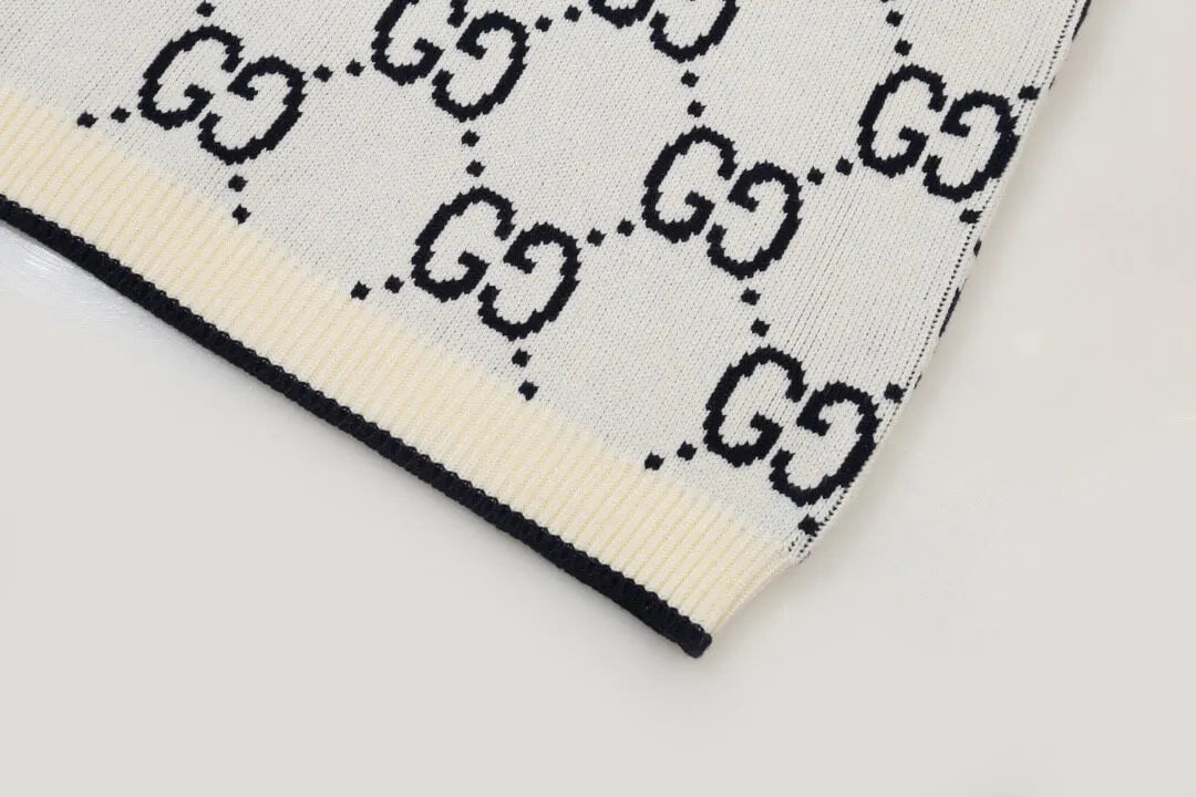 All‑Over Monogram Sweater